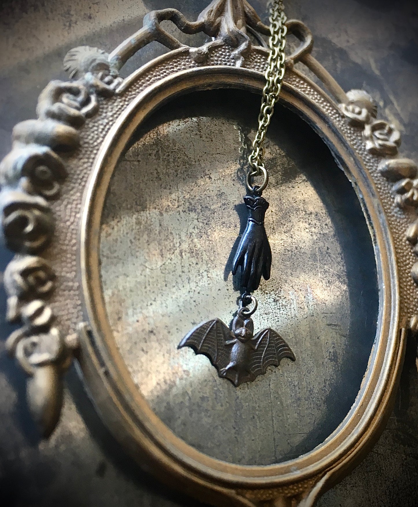 Haunted Victorian Hand and Bat Necklace